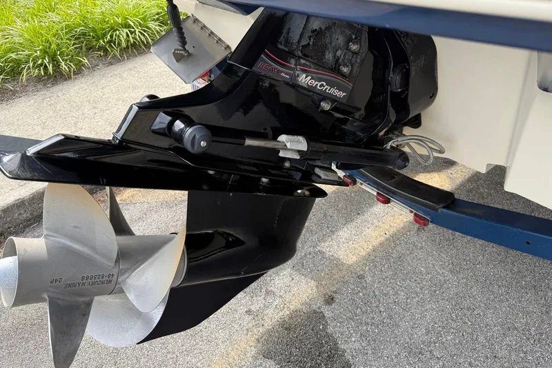 Slide: The Image of 2008 Sea Ray 230 Bow Rider Select with MerCruiser engine and propeller detail. - 16