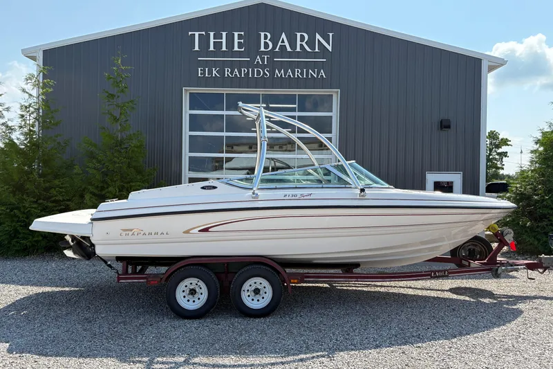 The Image of 1997 Chaparral 2130 Sport boat on trailer at Elk Rapids Marina. - 1