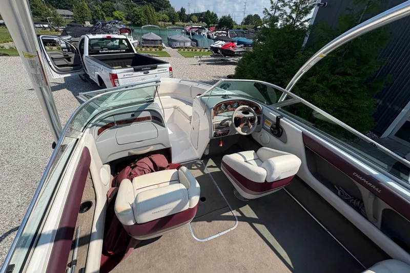 Slide: The Image of 1997 Chaparral 2130 Sport boat interior with steering wheel, seats, and dashboard. - 5