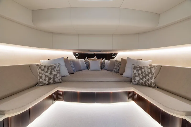 Slide: The Image of Luxurious interior of 2024 CNM CONTINENTAL 54 SuperSport yacht with elegant seating and cushions. - 3