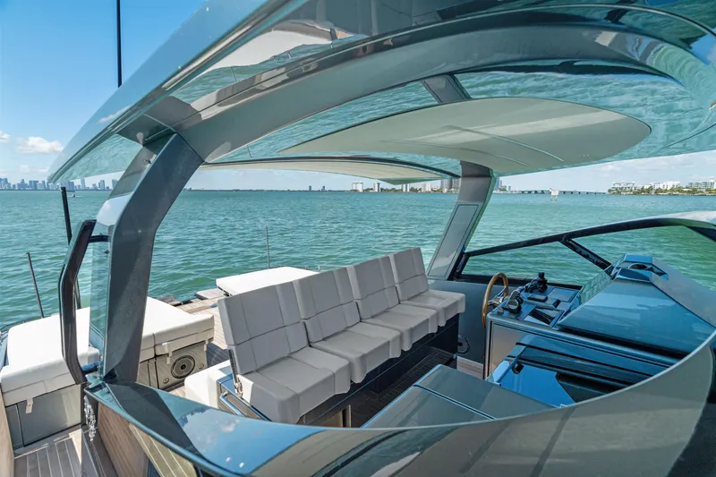 Slide: The Image of Luxurious 2024 CNM CONTINENTAL 54 SuperSport yacht interior with sleek design and waterfront view. - 31