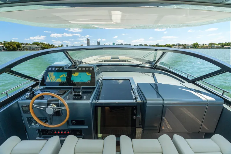 Slide: The Image of 2024 CNM CONTINENTAL 54 SuperSport yacht cockpit with modern navigation system and panoramic view. - 35