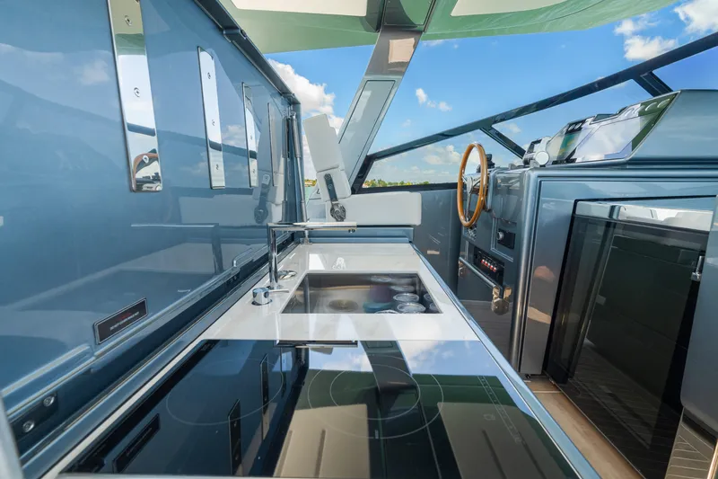 Slide: The Image of Modern kitchen interior on 2024 CNM CONTINENTAL 54 SuperSport yacht. - 39