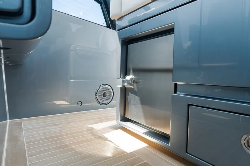 Slide: The Image of 2024 CNM CONTINENTAL 54 SuperSport interior with sleek cabinetry and modern design. - 41