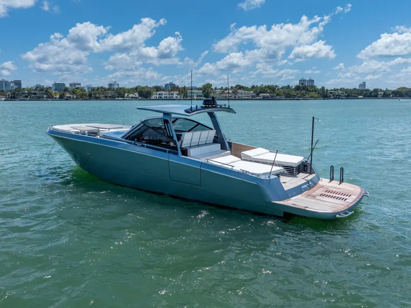 Slide: The Image of 2024 CNM CONTINENTAL 54 SuperSport yacht on calm water under blue sky. - 7