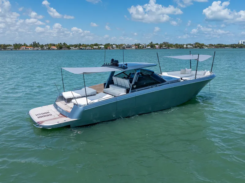 Slide: The Image of 2024 CNM CONTINENTAL 54 SuperSport yacht on calm water under blue sky. - 8