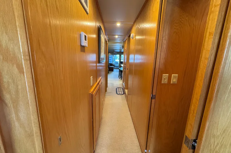 Slide: The Image of 2002 Sumerset Houseboat deck with railing and water view. - 25