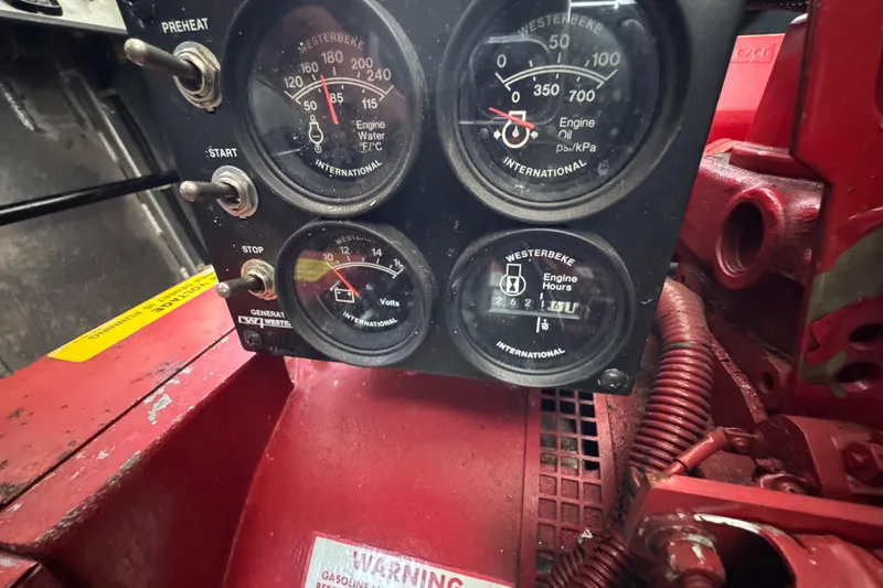 Slide: The Image of Luxurious 2002 Sumerset houseboat interior with cozy seating, entertainment center, and elegant wood finishes. - 31