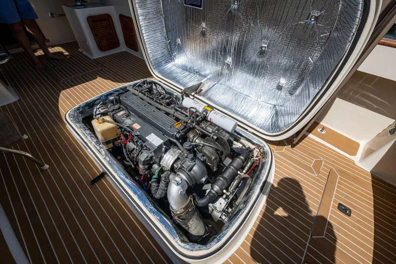 Slide: The Image of Engine compartment of a 2001 Hinckley Picnic Boat Classic, showcasing detailed mechanical components. - 17