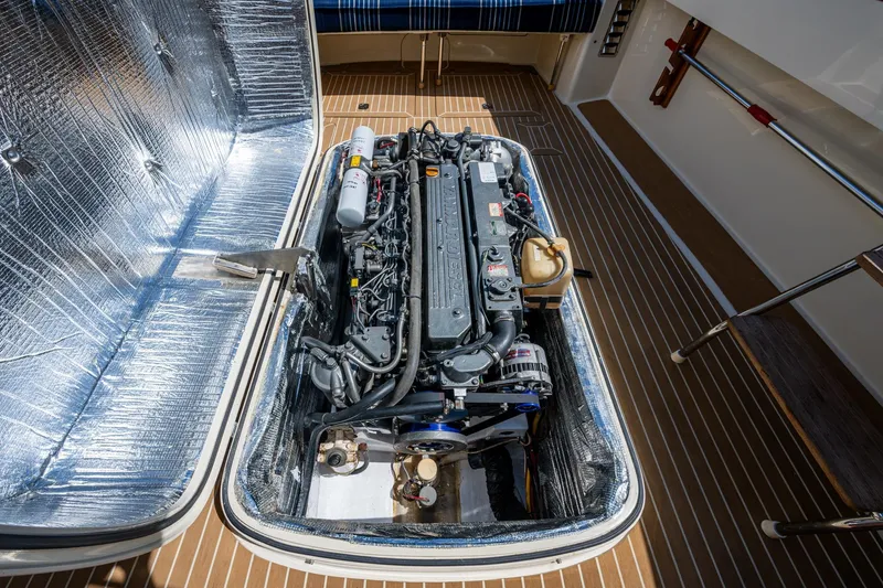 Slide: The Image of Engine compartment of a 2001 Hinckley Picnic Boat Classic, showcasing detailed mechanics. - 20