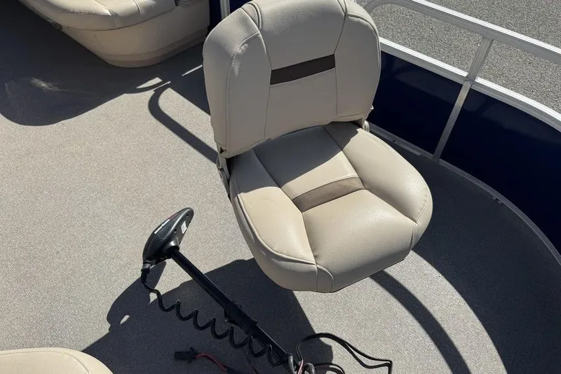 Slide: The Image of 2017 Sun Tracker FISHIN' BARGE® 20 DLX boat seat with trolling motor on deck. - 15