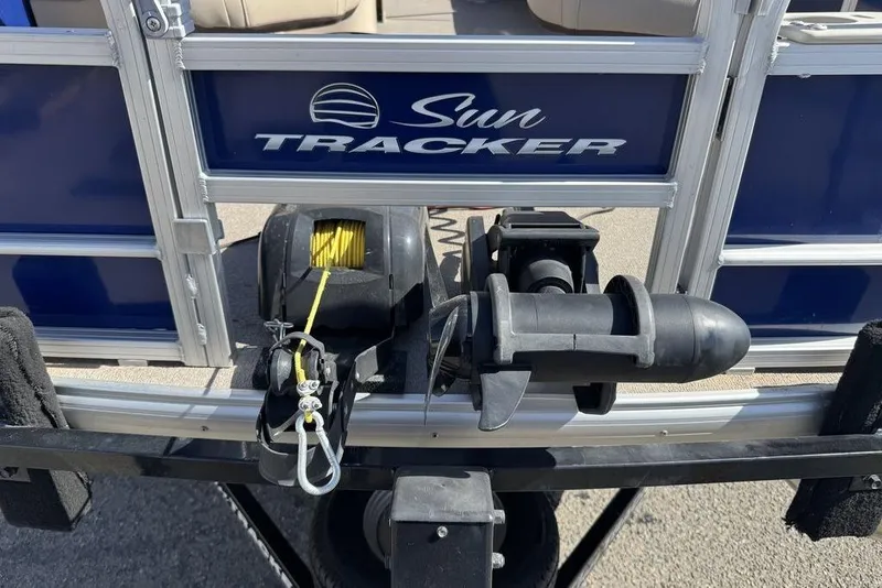 Slide: The Image of 2017 Sun Tracker FISHIN' BARGE® 20 DLX boat with winch and trailer attachment. - 20