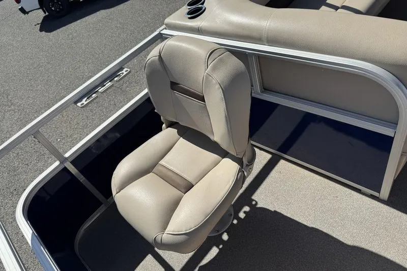 Slide: The Image of 2017 Sun Tracker FISHIN' BARGE® 20 DLX boat seat, beige upholstery, cup holders. - 30