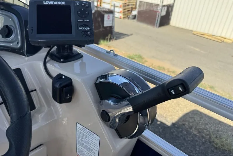 Slide: The Image of Control panel of 2017 Sun Tracker FISHIN' BARGE® 20 DLX with Lowrance fish finder. - 44