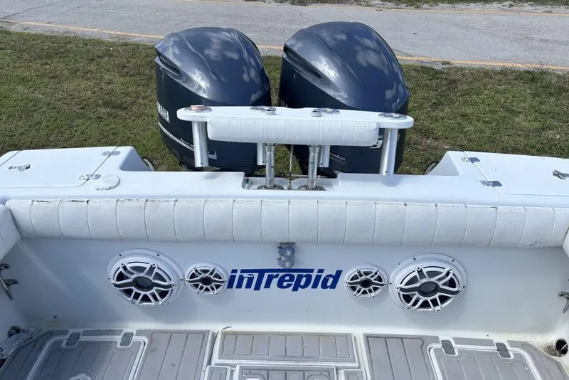 Slide: The Image of 2000 Intrepid 322 Cuddy boat with Yamaha engines and marine speakers. - 21