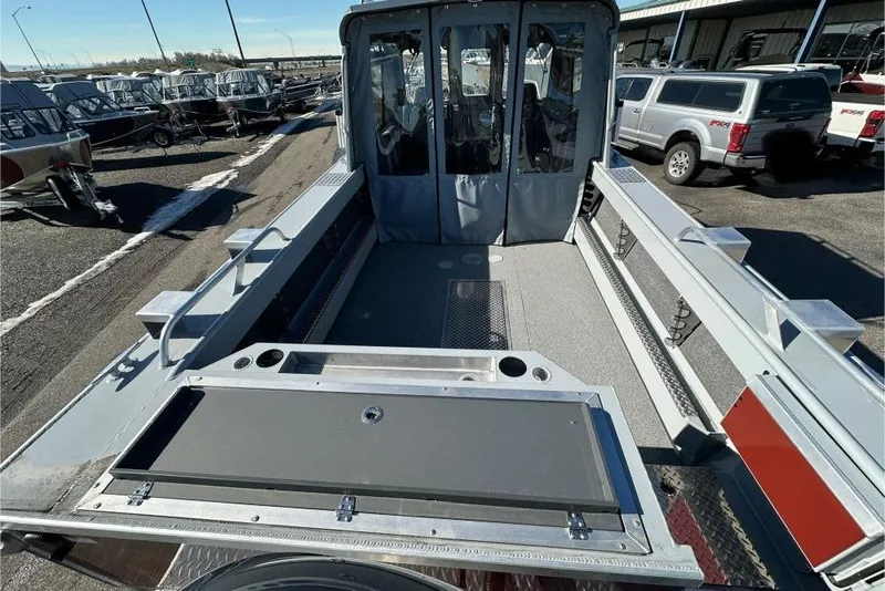 Slide: The Image of 2025 Hewescraft 240 Ocean Pro ET HT boat interior, featuring spacious deck and modern design. - 4