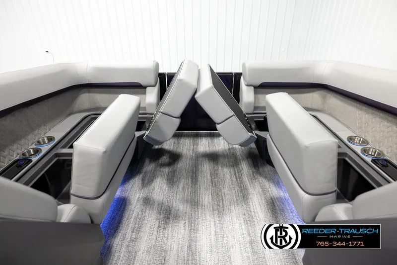 Slide: The Image of 2026 Bennington 22 MFBSE boat interior with luxurious seating and cup holders. - 16