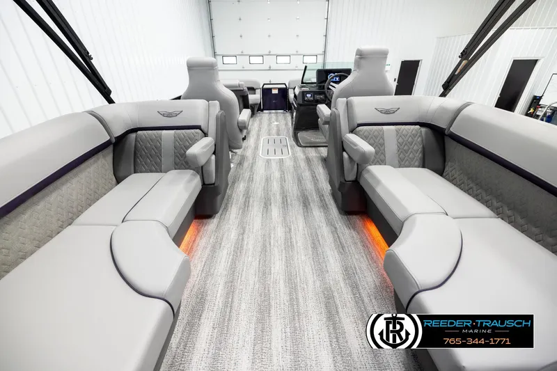 Slide: The Image of Luxurious interior of 2026 Bennington 22 MFBSE pontoon boat with plush seating and modern design. - 17