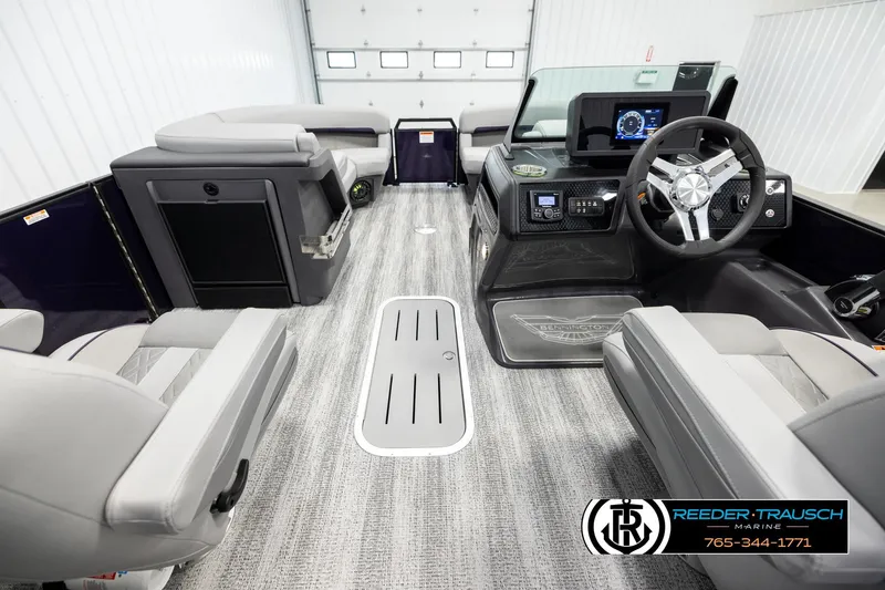 Slide: The Image of 2026 Bennington 22 MFBSE boat interior with modern dashboard and seating. - 18