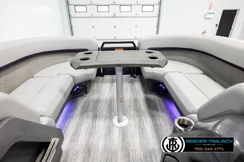Slide: The Image of Interior of 2026 Bennington 22 MFBSE pontoon boat with plush seating and modern design. - 20