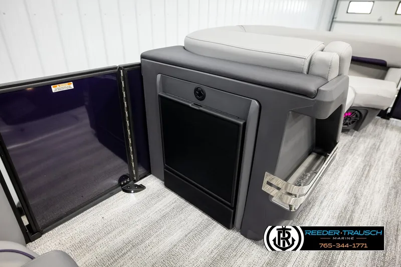 Slide: The Image of 2026 Bennington 22 MFBSE boat interior with seating and storage compartment. - 22