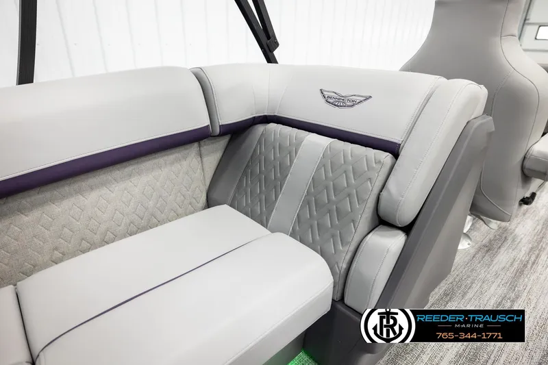 Slide: The Image of 2026 Bennington 22 MFBSE boat interior with luxurious gray seating and diamond pattern accents. - 25
