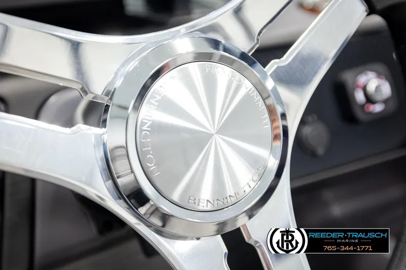 Slide: The Image of Close-up of 2026 Bennington 22 MFBSE steering wheel with chrome finish. - 29