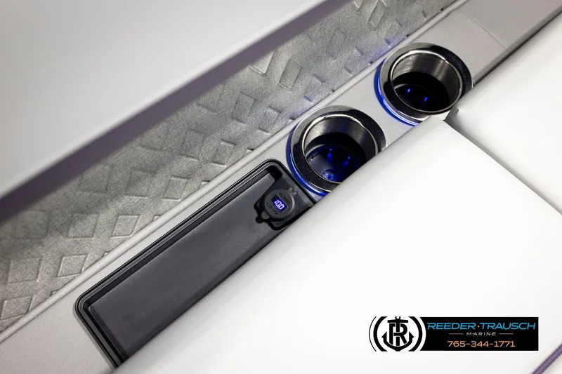 Slide: The Image of 2026 Bennington 22 MFBSE boat interior with cup holders and USB port. - 39