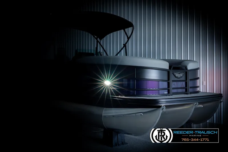 Slide: The Image of 2026 Bennington 22 MFBSE pontoon boat with sleek design and illuminated headlight. - 4
