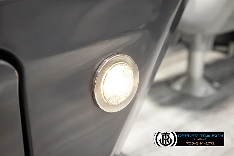 Slide: The Image of Close-up of a 2026 Bennington 22 MFBSE boat light, featuring sleek design details. - 40