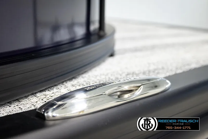 Slide: The Image of 2026 Bennington 22 MFBSE boat detail with sleek chrome cleat and textured surface. - 47