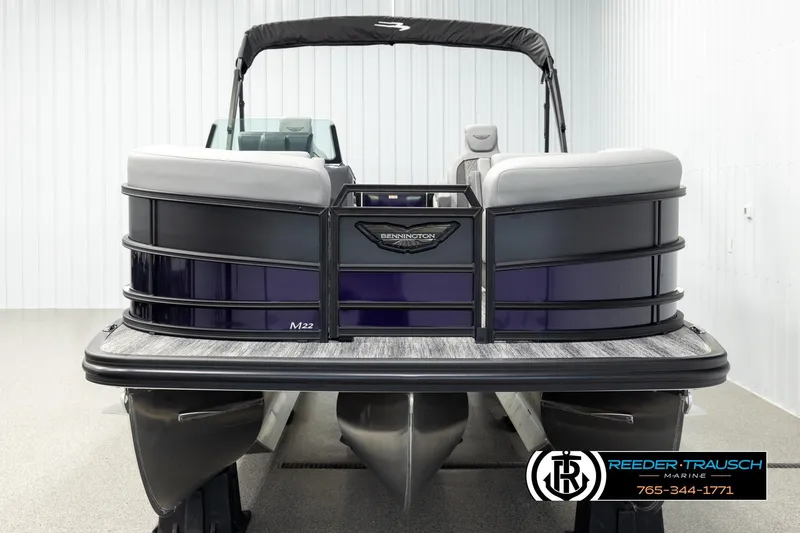 Slide: The Image of 2026 Bennington 22 MFBSE pontoon boat in showroom, front view. - 8