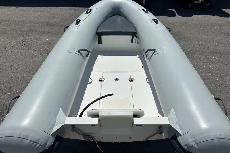 Slide: The Image of 2025 Geniuss 285 TILLER inflatable boat, gray, spacious interior, sturdy design. - 6