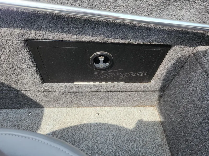 Slide: The Image of 2019 Tracker Targa V-18 Combo boat interior with storage compartment. - 17