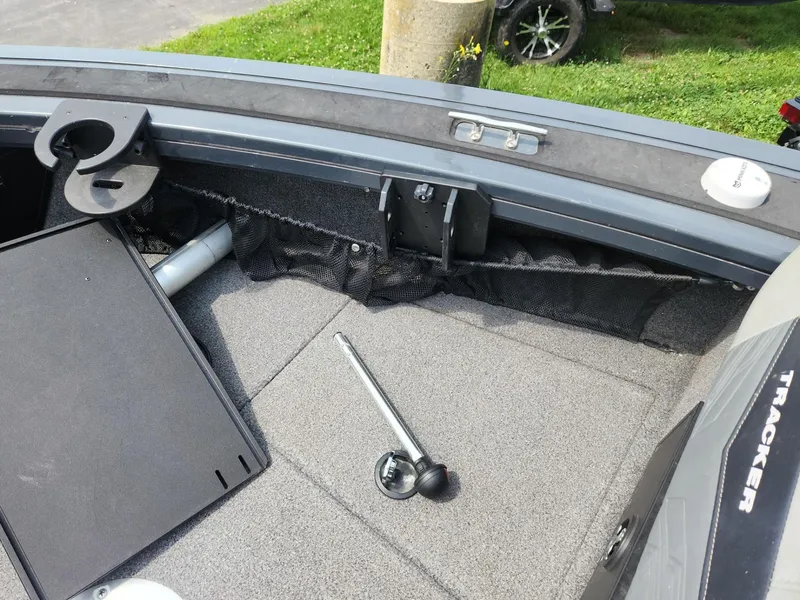 Slide: The Image of 2019 Tracker Targa V-18 Combo boat interior with storage compartments and accessories. - 35