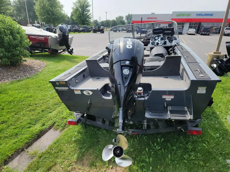 Slide: The Image of 2019 Tracker Targa V-18 Combo boat with outboard motor in dealership lot. - 5