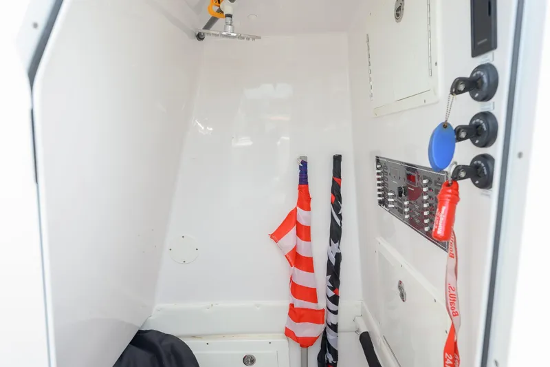 Slide: The Image of Interior of 2018 SeaHunter 33 Tournament boat with flags and control panel. - 7