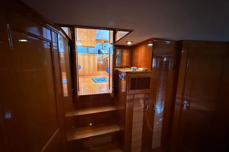 Slide: The Image of Interior view of 2002 Grand Banks 42 Classic yacht with polished wood finish. - 34