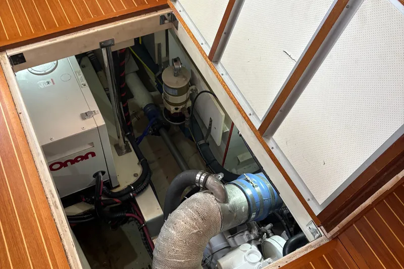 Slide: The Image of Engine room of 2002 Grand Banks 42 Classic yacht with Onan generator. - 66