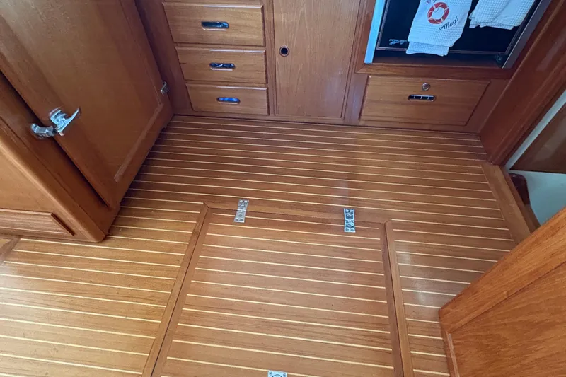 Slide: The Image of Wooden interior of 2002 Grand Banks 42 Classic yacht, featuring polished cabinetry and flooring. - 69