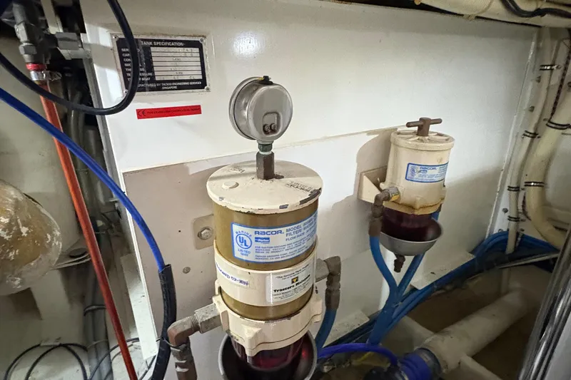 Slide: The Image of Engine room of 2002 Grand Banks 42 Classic with Racor fuel filters. - 77
