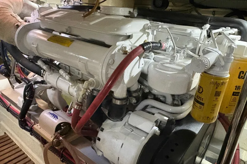 Slide: The Image of Engine room of 2002 Grand Banks 42 Classic yacht, showcasing detailed machinery. - 88