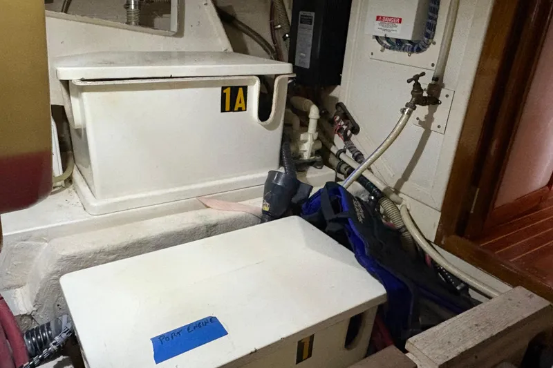 Slide: The Image of Engine room of 2002 Grand Banks 42 Classic with labeled components and wiring. - 89