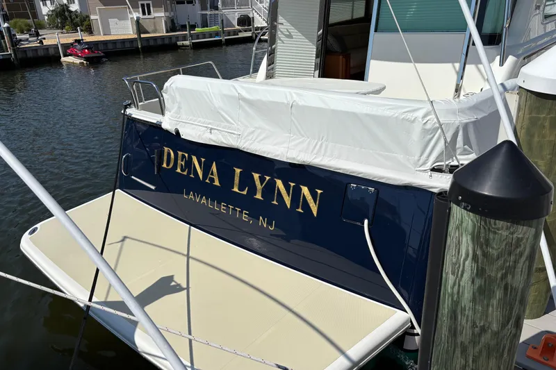Slide: The Image of 2021 Sabre 48 Salon Express yacht docked, named "Dena Lynn," Lavallette, NJ. - 2
