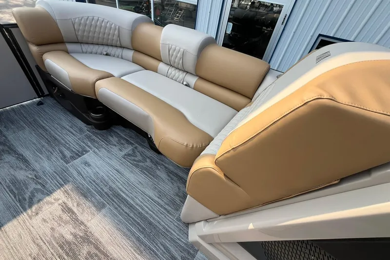Slide: The Image of 2025 Avalon Catalina Quad Lounger with luxurious tan and white seating on a stylish deck. - 22