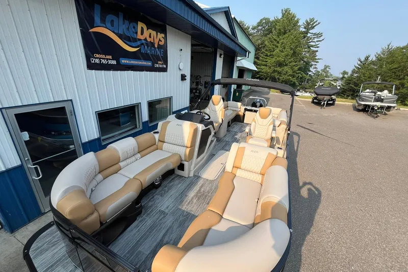 Slide: The Image of 2025 Avalon Catalina Quad Lounger pontoon boat at Lake Days Marine dealership. - 6