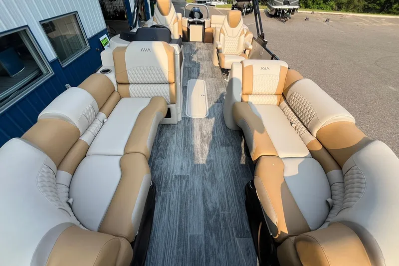 Slide: The Image of 2025 Avalon Catalina Quad Lounger with luxurious beige and white seating on a pontoon boat. - 8