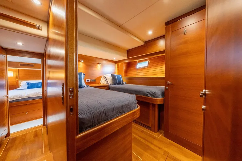 Slide: The Image of Luxurious wooden bathroom interior of 2016 Grand Banks 72 Aleutian RP yacht. - 102
