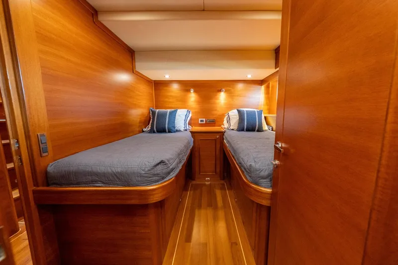 Slide: The Image of Luxurious bathroom interior of 2016 Grand Banks 72 Aleutian RP yacht, featuring wood accents and modern fixtures. - 108