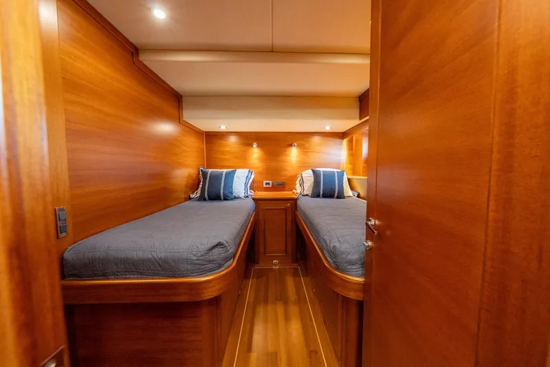 Slide: The Image of Luxurious wooden cabin interior of 2016 Grand Banks 72 Aleutian RP yacht. - 109